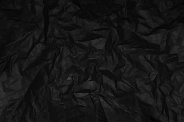 Zwart Gerimpeld Papier Textuur Reliëf Achtergrond — Stockfoto