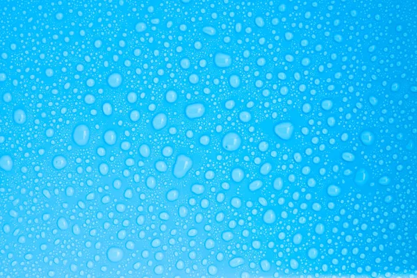 Closeup Σταγόνες Νερό Μπλε Φόντο — Φωτογραφία Αρχείου