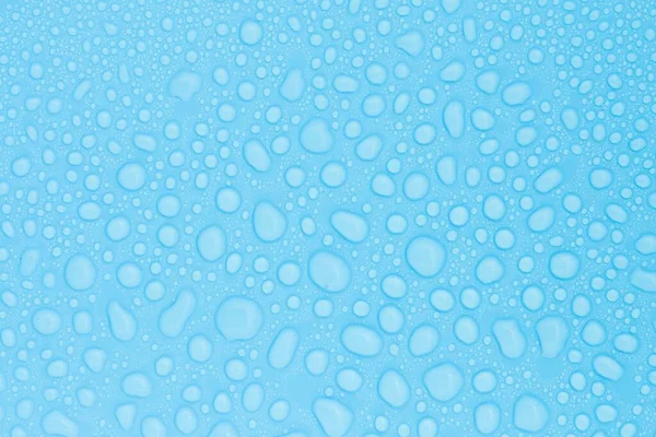 Nahaufnahme Tropfen Wasser Auf Blauem Hintergrund — Stockfoto