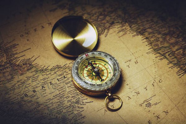 Bangkok, Thailand - June 14, 2018: Old compass on antique map.