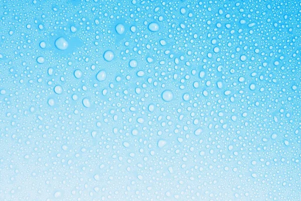 Nahaufnahme Tropfen Wasser Auf Blauem Hintergrund — Stockfoto