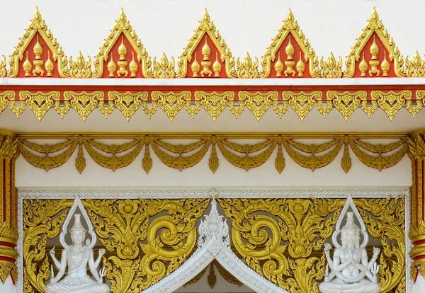 Ancient thai stucco pattern art on roof at temple - Buddha temple in Thailand