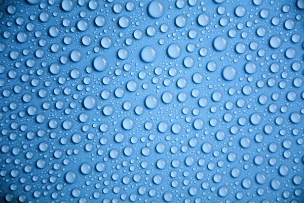 Tropfen Wasser Auf Blauem Hintergrund — Stockfoto