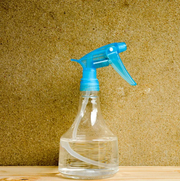 Water Sprayer Wood Desk Cement Room Background — Stock Photo, Image