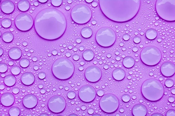 Modello Uno Sfondo Viola Gocce Acqua — Foto Stock