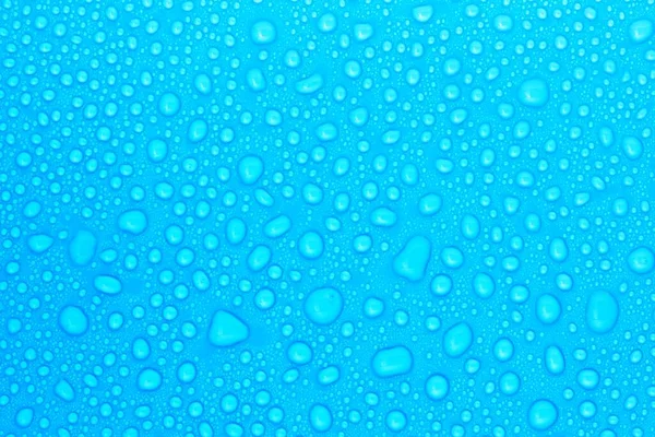 Primer Plano Gotas Agua Sobre Fondo Azul — Foto de Stock