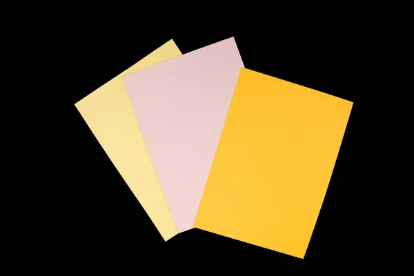 Orange Rosa Och Gult Papper Isolerad Svart Bakgrund — Stockfoto
