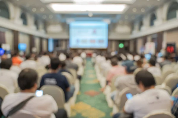 Blurred background of audience in the conference hall or seminar room,Business Meeting Concept