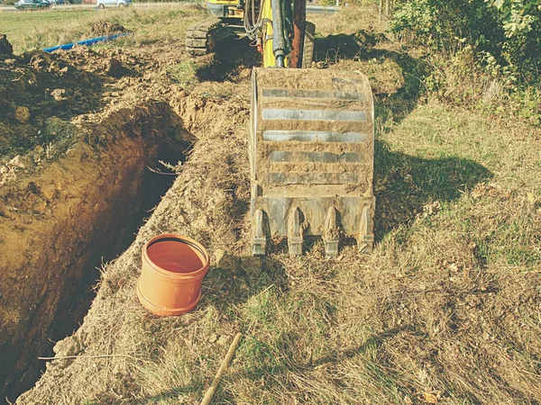 工事現場の掘削機からシャベルします 掘り交換別のツール シャベル — ストック写真