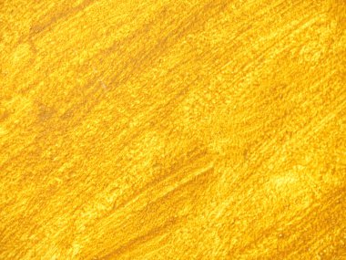 Kalın fırça sıva duvar üzerinde turuncu Boya aplicated. Gerçek kumlu alçı duvara 