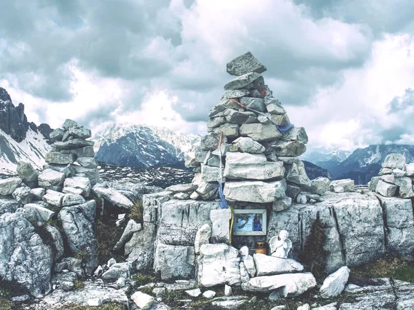The stony tombstone for Alpine victim. Zen stones meditation landscape. Calm and spiritual nature.