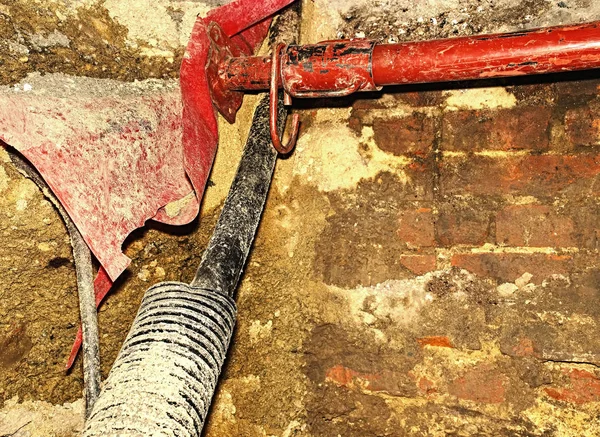 Building of lines of metallic and fiber optic cables of communication network connection.  The trench carries the conduits for gas water electric sewage and phone services