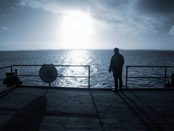 Man Alone Stay Sea Bridge Watch Amazing Sunrise Autumnal Moody — Stock Photo, Image