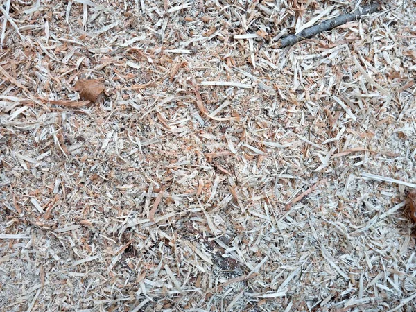 Mulch made from wood chips and saawdust and bark pices. Natural material for gardening.