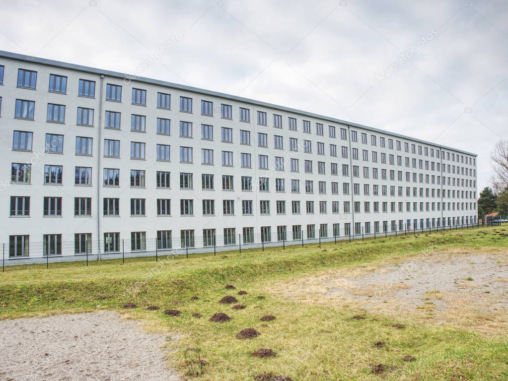 Concrete Buildings with broken windows at Prora, Ruegen, Germany. Restoration of abandoned flat houses. 