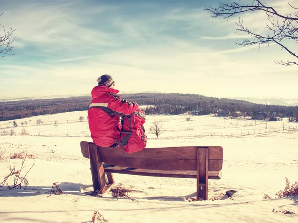 Man Tourist Resting Wooden Bench Winter Landscape Hiker Red Backpack — Stock Photo, Image