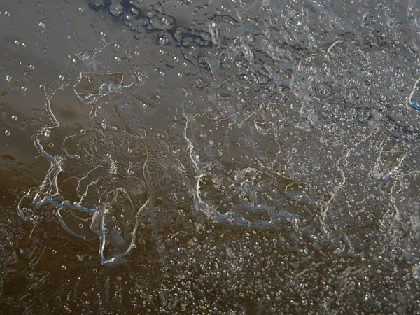 Bubbles of frozen water. Broken piece of ice