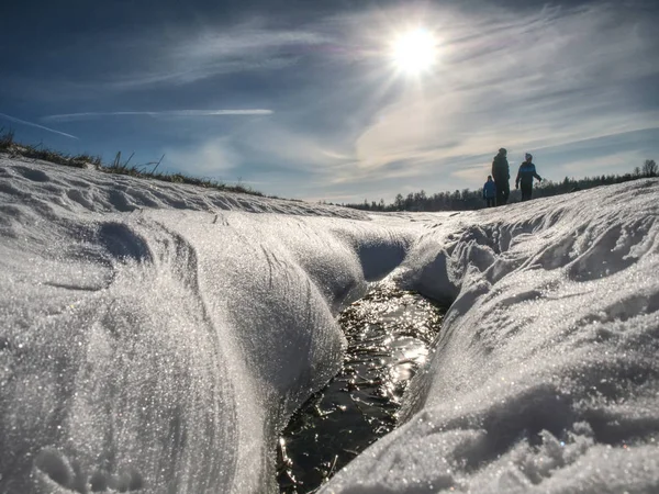 Group of hikers walking on snowy path — Stock Photo, Image