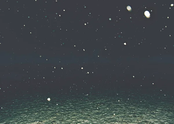 Schneefall in der dunklen Silvesternacht. — Stockfoto