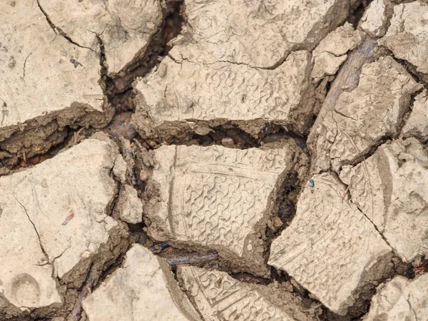 Krakované bahno vhodné jako pozadí, symbol klimatické změny — Stock fotografie