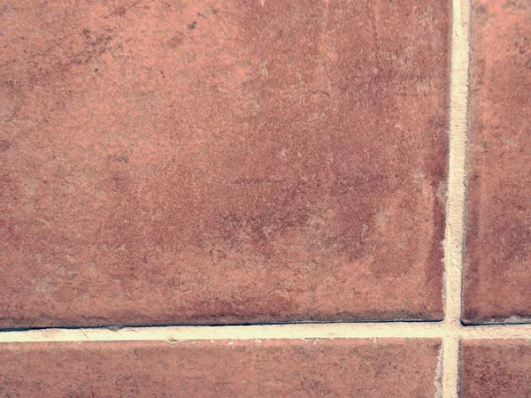 Vörösbarna négyszögletes padlólapok beltéri használatra. — Stock Fotó