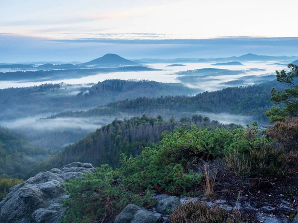 Summer morning with clear blue sky and rising sun over hills Hilly landscape view from above. Scenic natural background.