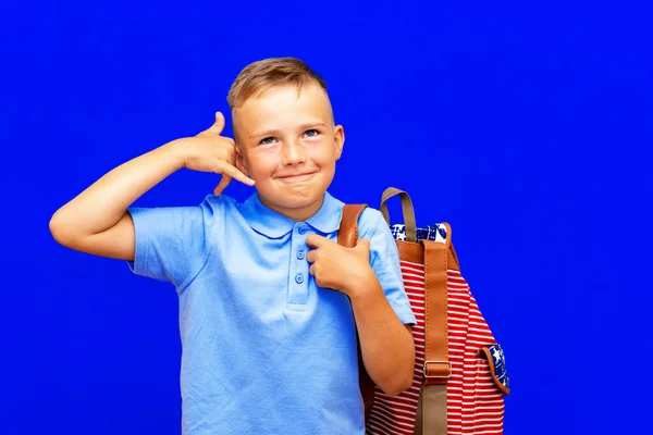 Young Caucasian Schoolboy Doing Phone Gesture Says Call Back Isolated — Stock Photo, Image