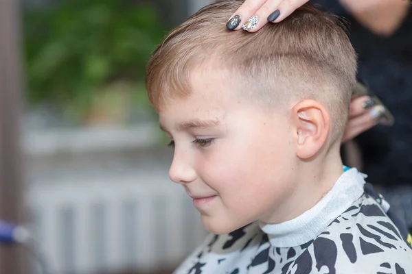 Happy Calm Caucasian Schoolboy Sits Barbershop Cuts Hair — Stock Photo, Image