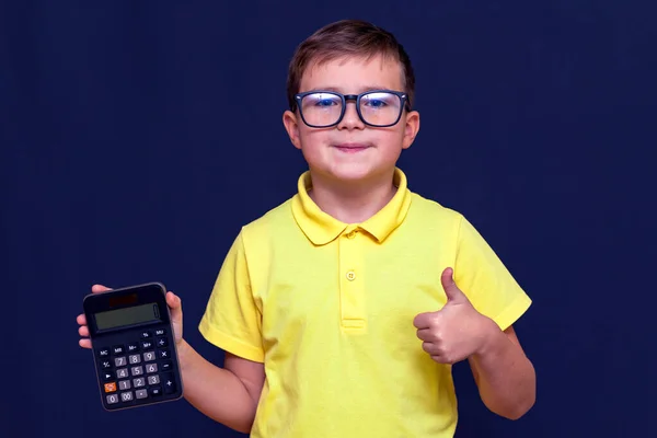 Close Attractive Young Schoolboy Eyeglasses Yellow Shirt Holds Calculator Shows — Stock Photo, Image