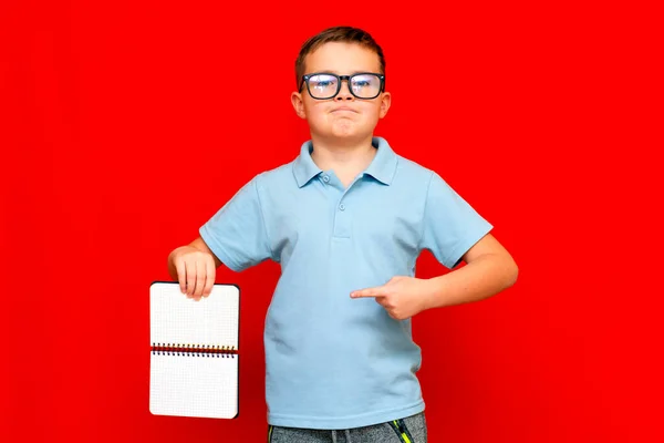 Cuccessful Serious Caucasian Boy Light Blue Shirt Glasses Holds Shows — Stock Photo, Image