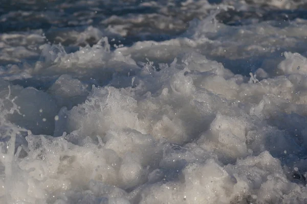 Sea texture with waves and foam.