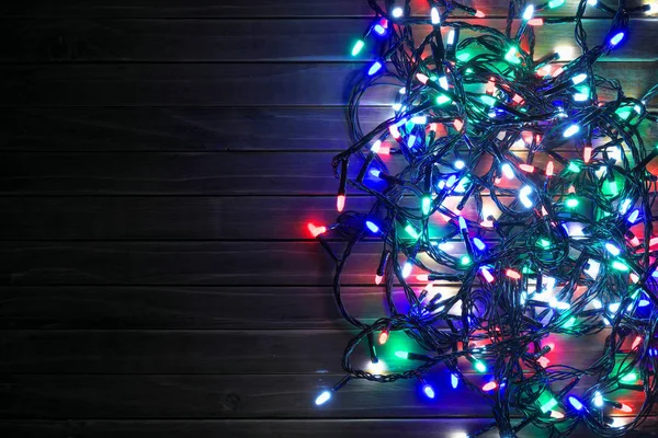Guirnalda Vacaciones Por Noche Fondo Navidad Madera Con Luces Colores —  Fotos de Stock