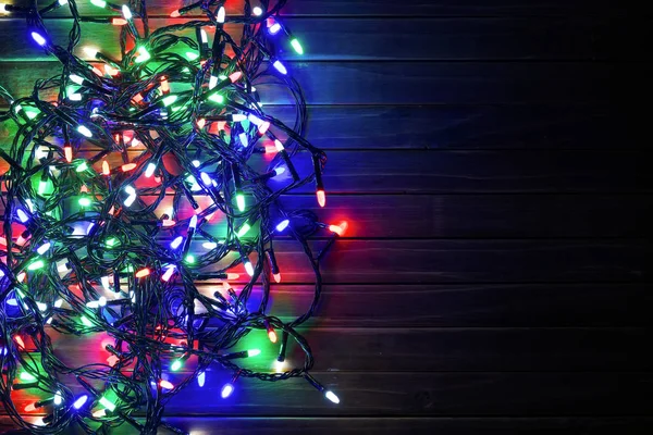 Guirnalda Vacaciones Por Noche Fondo Navidad Madera Con Luces Colores —  Fotos de Stock