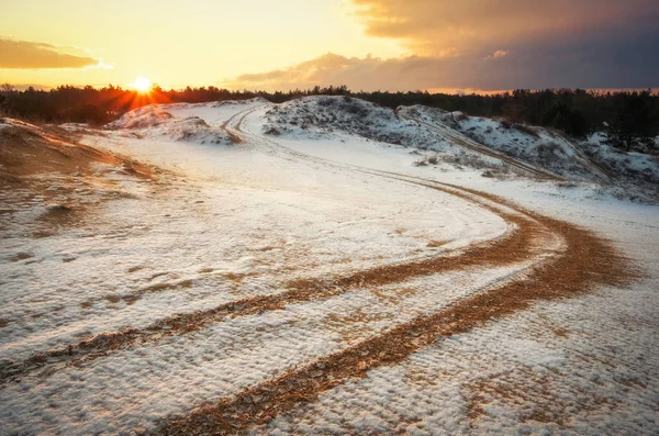 ATV auto sport track at winter. Wheel sandy tracks on snow
