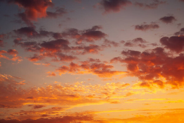 Fiery orange sunset sky as background. Beautiful magic colors
