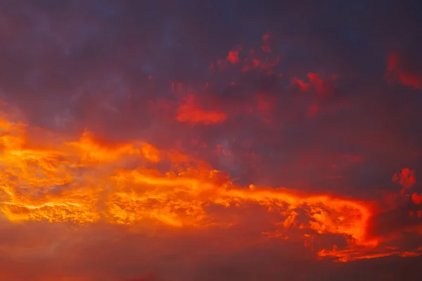 Beautiful fiery, orange and red, sunset sky. Evening Magic Scene