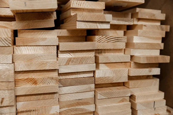 Stack of coniferous boards lying on the base Royalty Free Stock Images