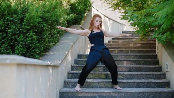 Caucasian woman doing breathing exercise outdoors — Stock Video