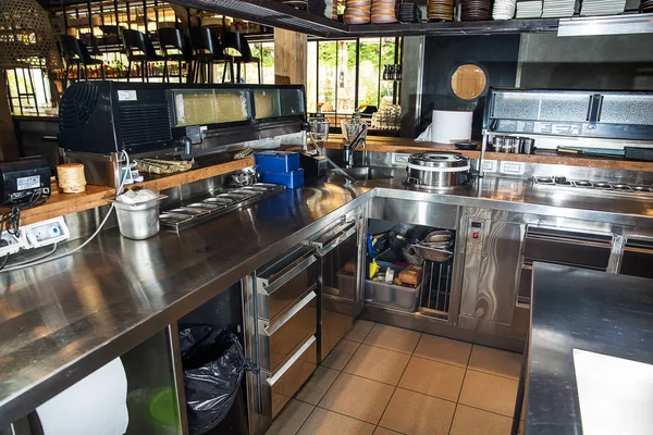 Professional kitchen, view counter in stainless steel .