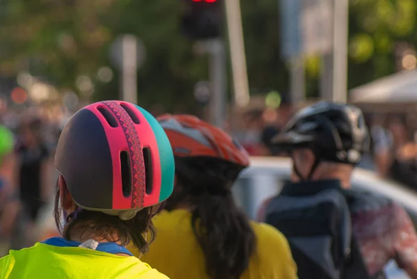 Bikers waiting for the light to cross