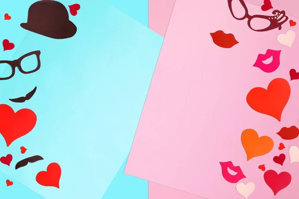 Hearts on a paper background. The concept of Valentine's Day — Stock Photo, Image