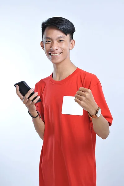 Success winner asian man winning on cellphone app. Cheering asia — Stock Photo, Image