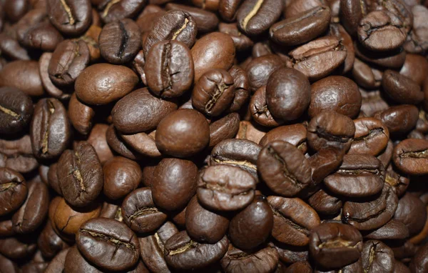 Granos de café tostados, café, alimentos aromáticos y bebidas. Vista superior textura plana — Foto de Stock