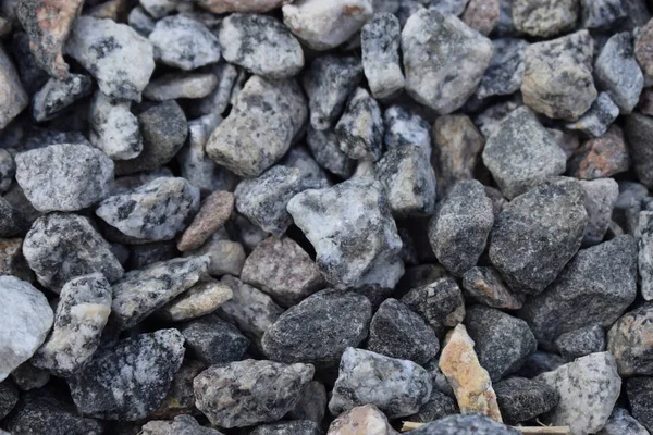 Kavics rock textúra. Zúzott kő és kavics a földön — Stock Fotó