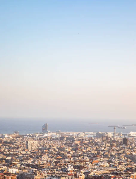 Foggy views of the city of Barcelona and the Mediterranean sea