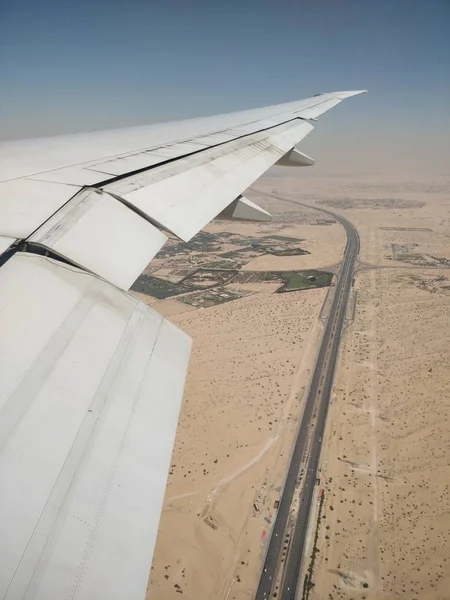 Vista aérea desde un avión de su ala — Foto de Stock