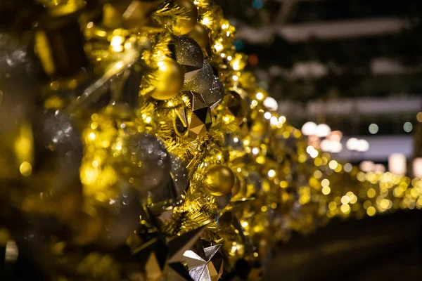 Close up of Christmas golden decoration with sparkles and lighjts — Stock Photo, Image