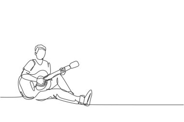 Genç ve mutlu erkek gitaristin sürekli çizdiği bir çizim akustik gitar çalarken yerde dinleniyor. Müzisyen sanatçı performans konsepti tek çizgi çizim vektör çizimi illüstrasyonu