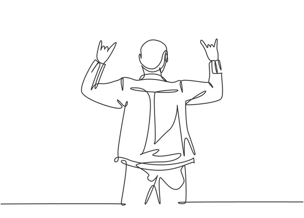 One continuous line drawing of young happy male rocker singer giving hand gesture of rock music on concert stage. Trendy musician artist performance concept single line draw design vector illustration