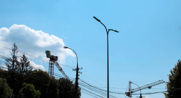 Silhouettes Construction Cranes Sky Background — Stock Photo, Image